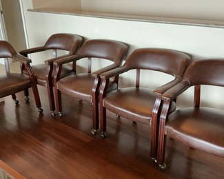 Lot 11: Set of 5 brown 'leather' dining chairs with wood frames