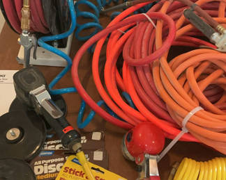 Lot 6: Coiled Hoses, Hose Reel, Pneumatic Tools, and Sanding Discs