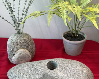 Lot 56: Decorative stone sculptures with potted plant and pedestal