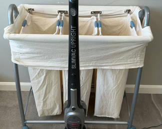 Lot 159: Rolling Hamper And Lightweight Vacuum