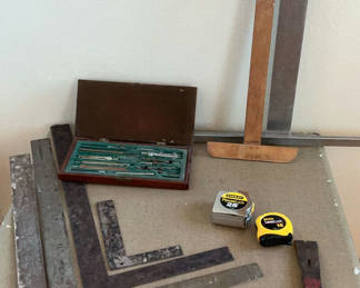Lot 44: Drafting tools with metal straightedges and tapes