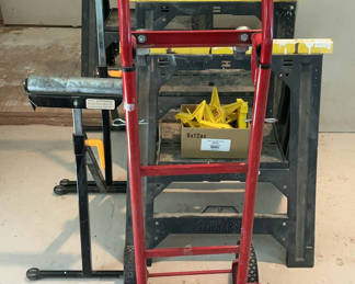 Lot 39: Red hand truck, roller stands and sawhorses