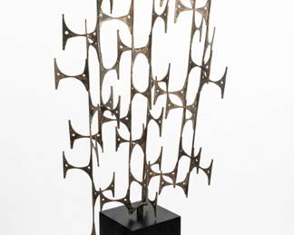 Mid-Century Modern abstract metal sculpture on pedestal