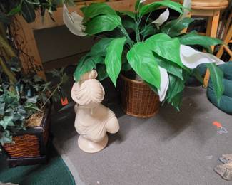 Bust of a Woman and a Faux Peace Lily