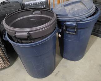 Three trash bins available, one with a lid
