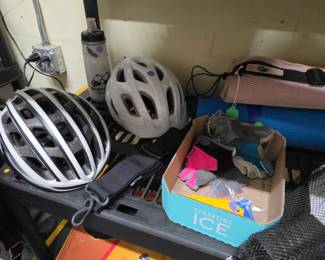 Bike Helmets, gloves, tools, and a Camelback water bottle