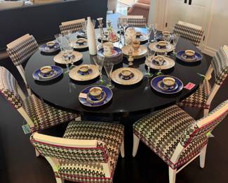 Table and chairs by Martin Lawrence Bullard, dishes by Hermes, moser Crystal 