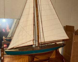 Wooden model ship on stand