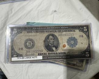 gold coins, silver coins, assorted currency