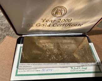 gold coins, silver coins, assorted currency