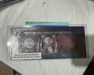 gold coins, silver coins, assorted currency