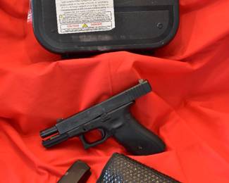 Glock 22, holster, magazine and box