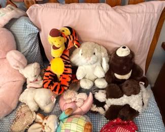 Stuffed animal collection with teddy bears, bunnies and Tigger plush