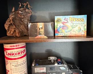 Vintage Tinkertoy canister with toy armored truck and board game