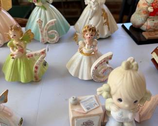 Precious Moments figurine with vintage ceramic angel and pastel dress girl figurines