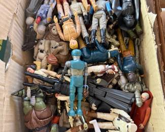 Large box of loose vintage action figures including Star Wars and G.I. Joe style figures