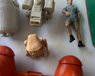 Assorted vintage action figures and toy space vehicles