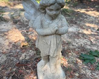 Concrete garden cherub angel statue with folded wings