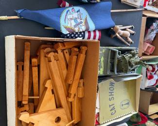 Box of assorted wood pieces with pennant banner and small American flag