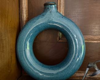 Large turquoise blue glazed ceramic donut ring vase