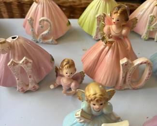 Vintage ceramic birthday angel figurines in pink and pastel dresses with gold trim