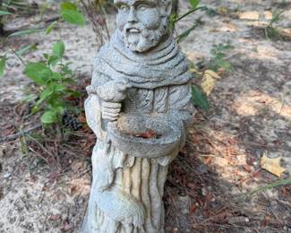 Concrete St. Francis garden statue in monk's robe