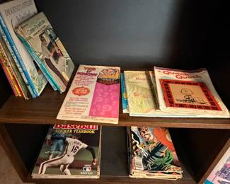 Vintage children's books, Peanuts books, comic books and Topps football sticker yearbook