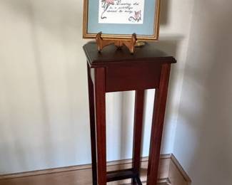 Tall wood plant stand pedestal table with framed print