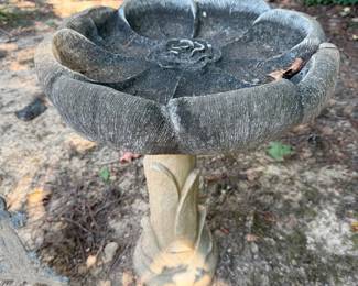 Concrete pedestal birdbath with scalloped leaf basin