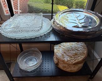 Pressed glass divided relish trays, silver plate serving tray and lidded baskets