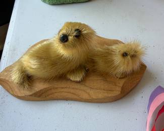 Sea otter mother and pup figurine with fur finish on wood base