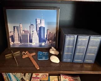 Framed New York City skyline photograph, wood crosses and photo albums