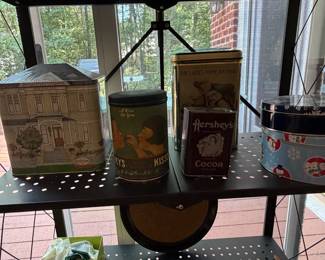 Vintage advertising tins including Hershey's Kisses, Hershey's Cocoa and Christmas tins