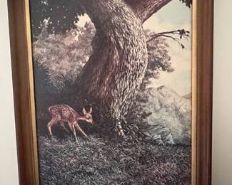 Framed forest landscape print with fawn deer in wood frame
