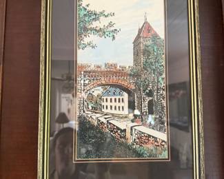 Framed European bridge and tower street scene print in gold frame