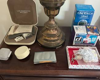 Lady Remington Boutique shaver set in case with brass candlestick and personal care items