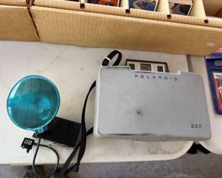 Vintage Polaroid 320 Land Camera with flash attachment