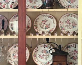 Royal Doulton, and the pattern appears to be H2555, described as βBird Center, Floral & Blue Band Rim. 9"