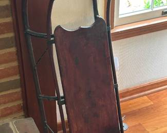 Charming antique child’s sled with wonderful age and character. Beautifully aged wood and original metal runners 