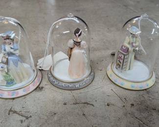Small Figurines in Glass Globes