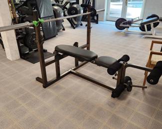 weigh bench w/ leg extension: $120. Bar: $40