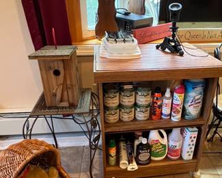 Cleaning supplies, child’s baby carriage birdhouse