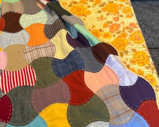 vintage handmade quilt utilizing the "Apple Core" pattern