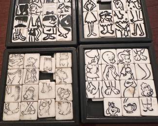 Rare plastic puzzles sliding tile puzzles made by the Roalex Company