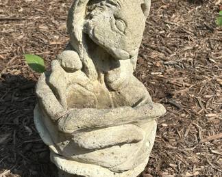 Cast concrete lawn statues