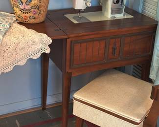 Antique sewing machine with chair