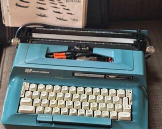 blue Smith-Corona Sterling Automatic 12 electric portable typewriter