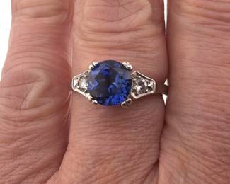 Platinum synthetic sapphire diamond ring