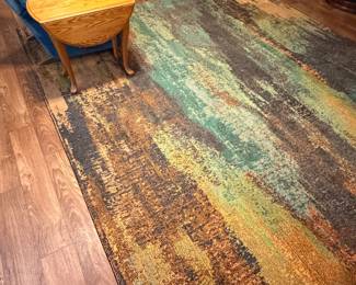 Multiple rooms with rugs