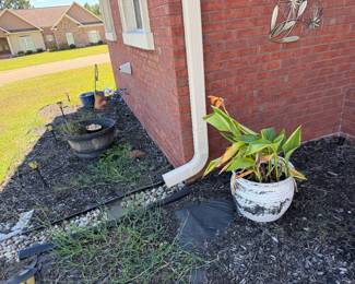 Outdoor pots and plants and yard decor